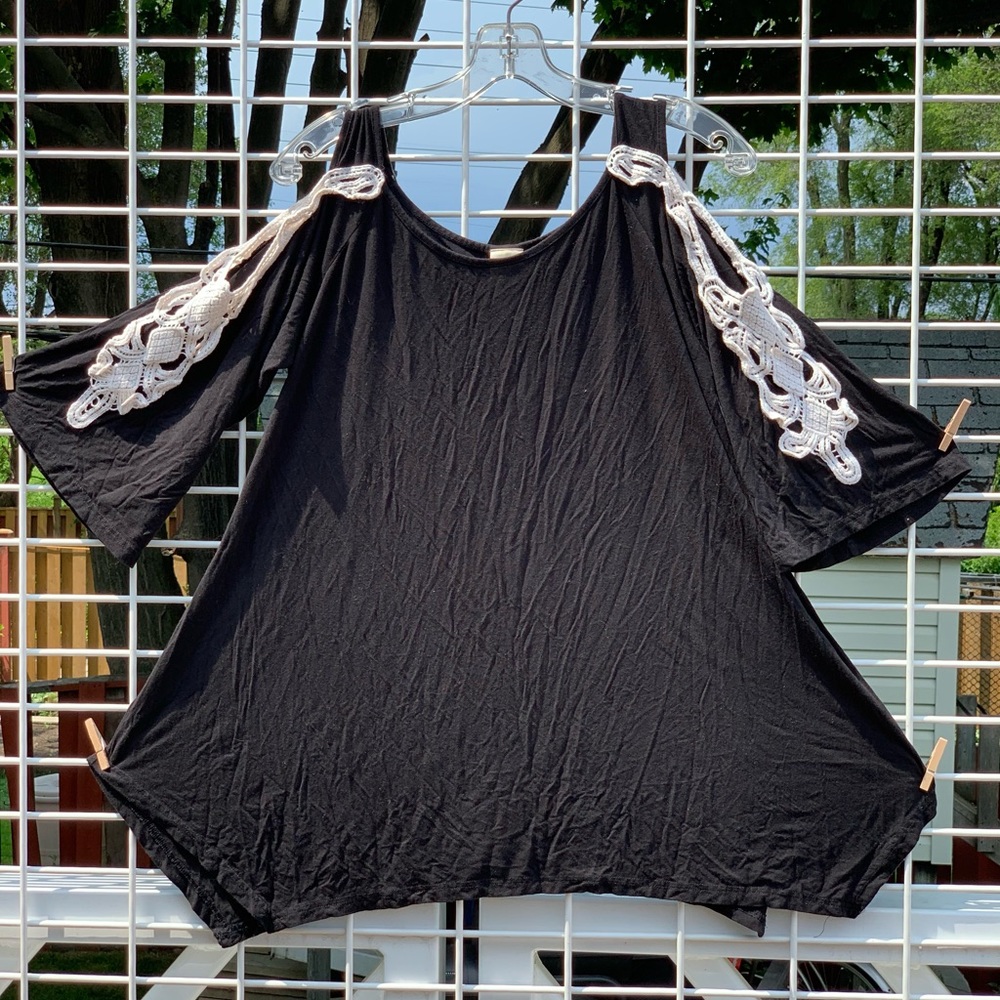 Black tank missing shoulder lace detail